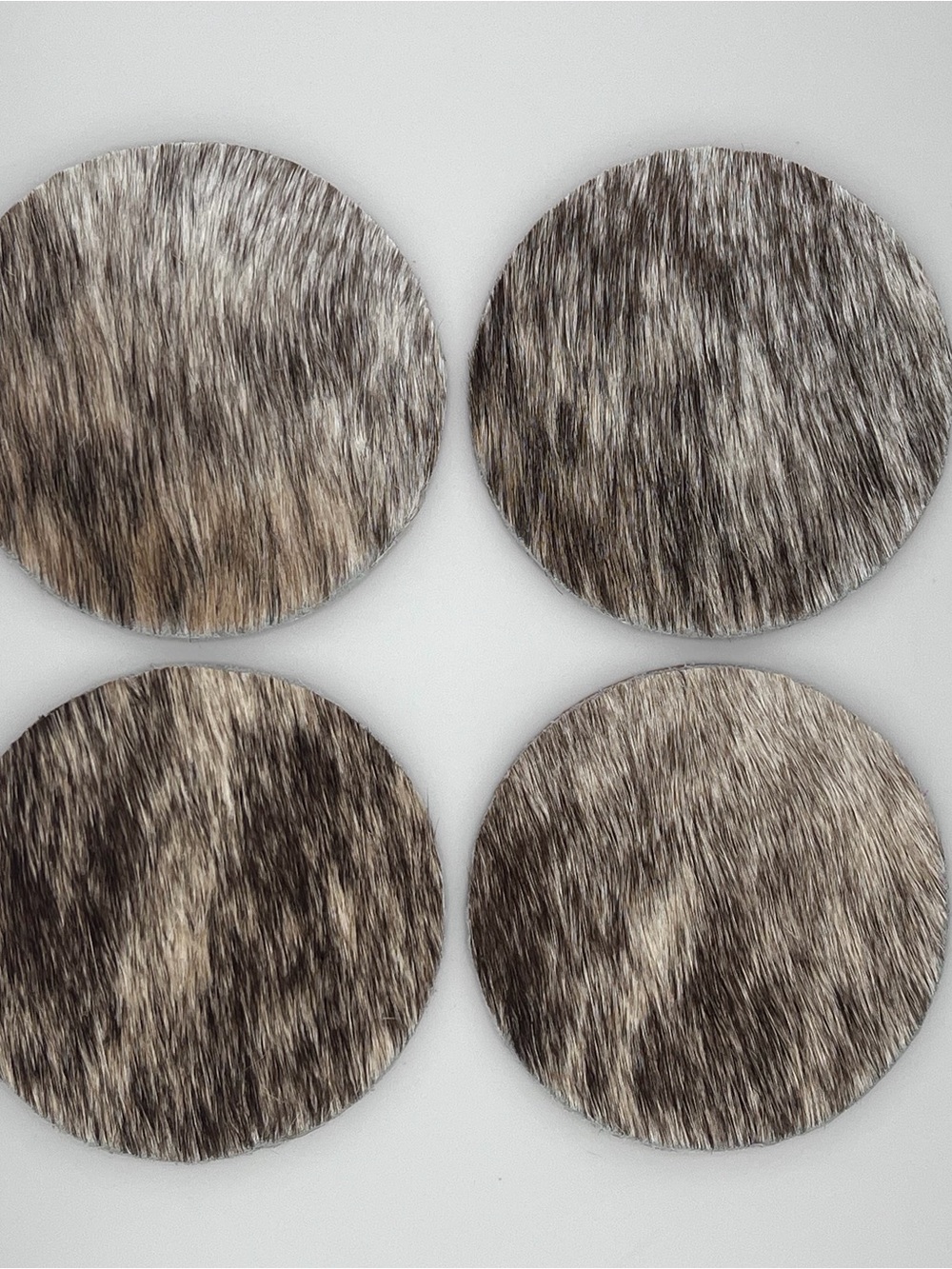 Round Hair-On Leather Coasters in Gray-Brown Fur (Set of 4)